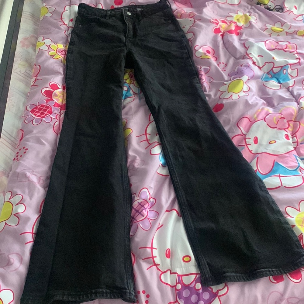 Higher high rise black flare jeans.